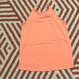 EUC ATHLETA XS peach toned yoga tank with fun back design
